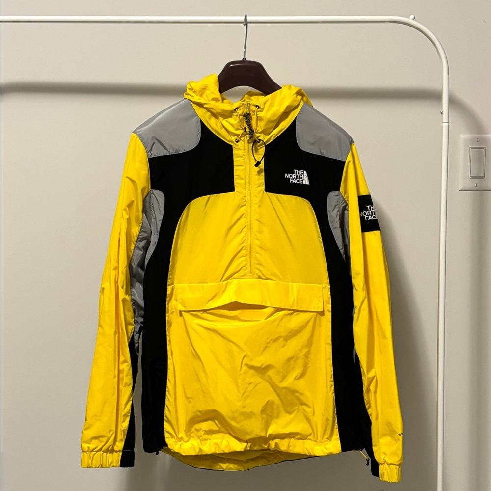 The North Face yellow gorpcore windbreaker. Size M